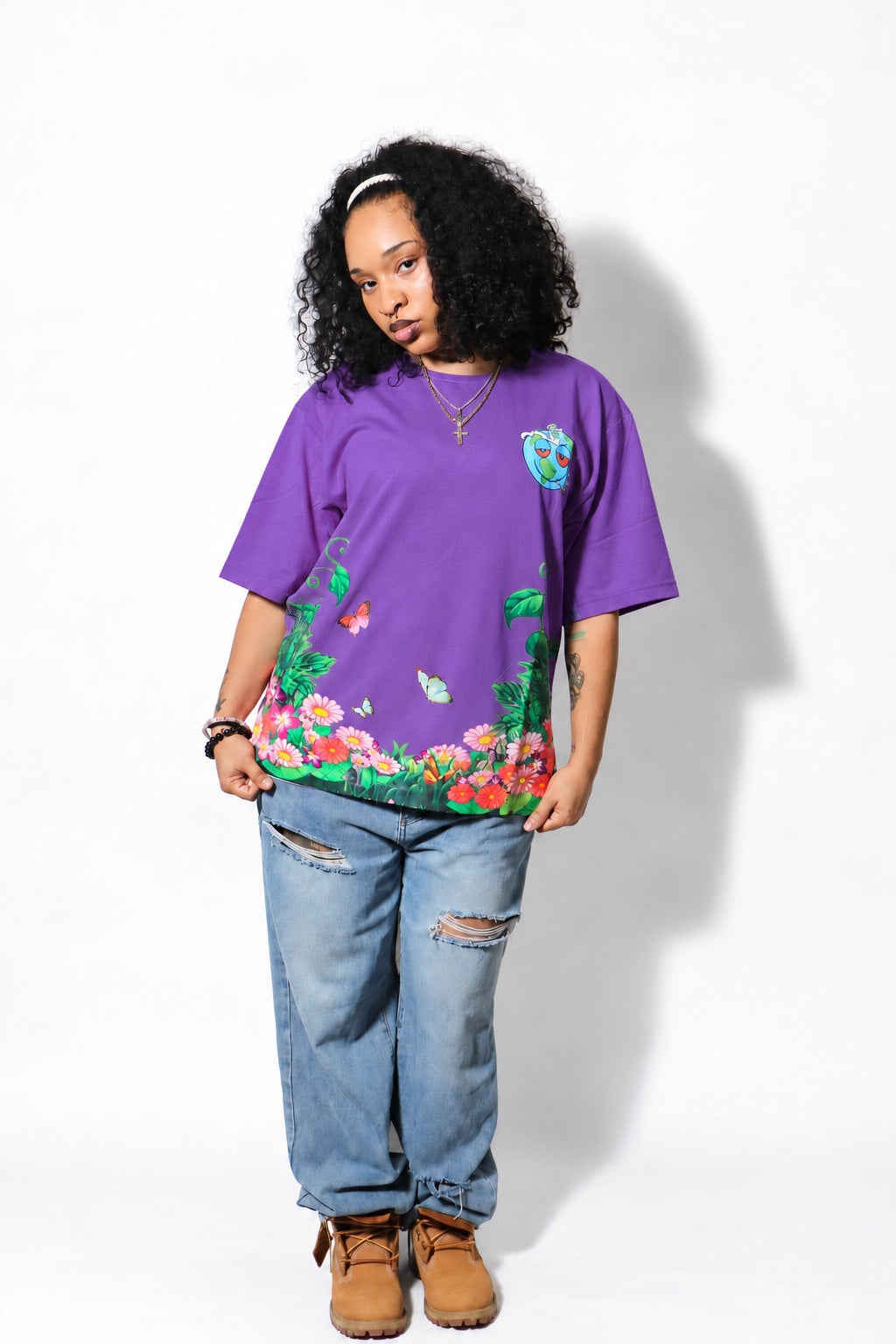Model wearing the purple Gaia tee in the studio