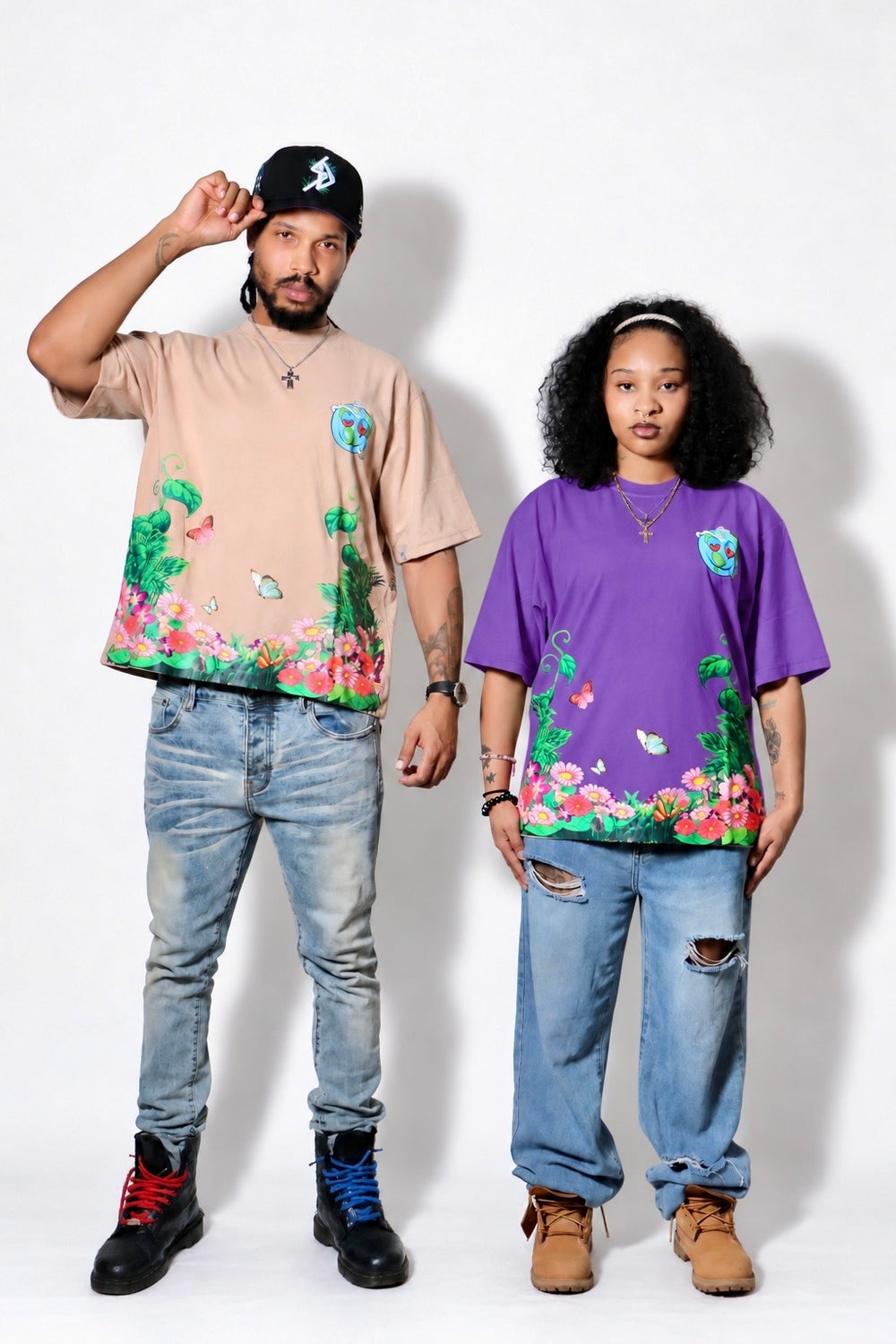 Two models wearing Gaia tees in beige and purple