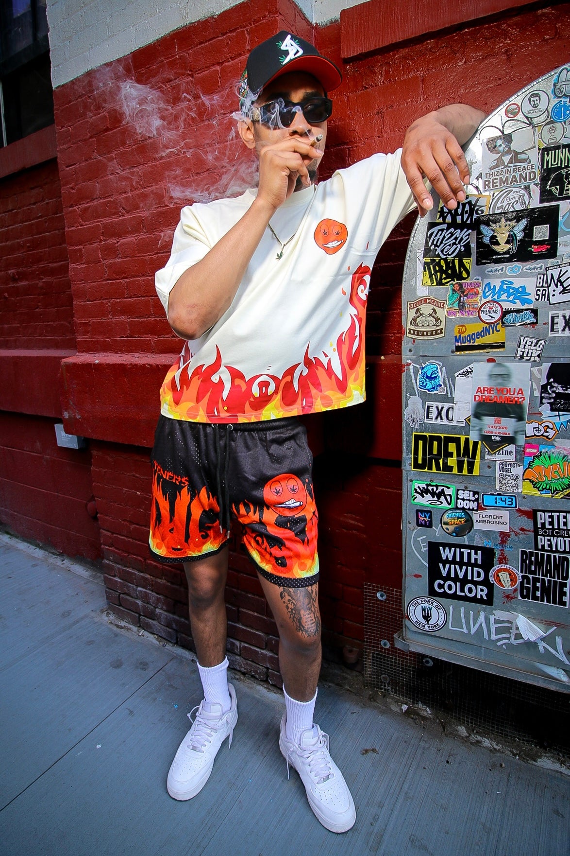 Model wearing the off-white Mars tee and matching shorts on a New York street